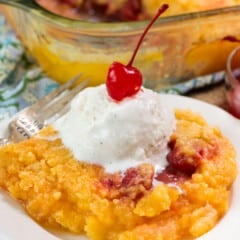 pineapple cake on white plate with ice cream and cherry