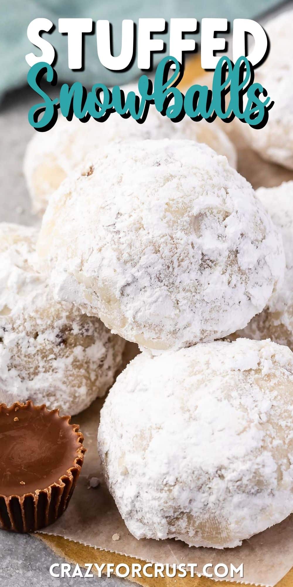 full snowball stacked on other snowballs covered in powdered sugar with words on the photo