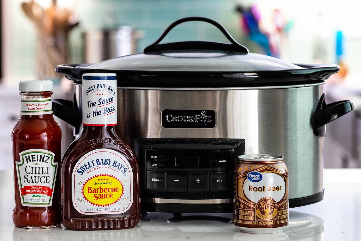 photo of crockpot with chili sauce and barbecue sauce and root beer in front