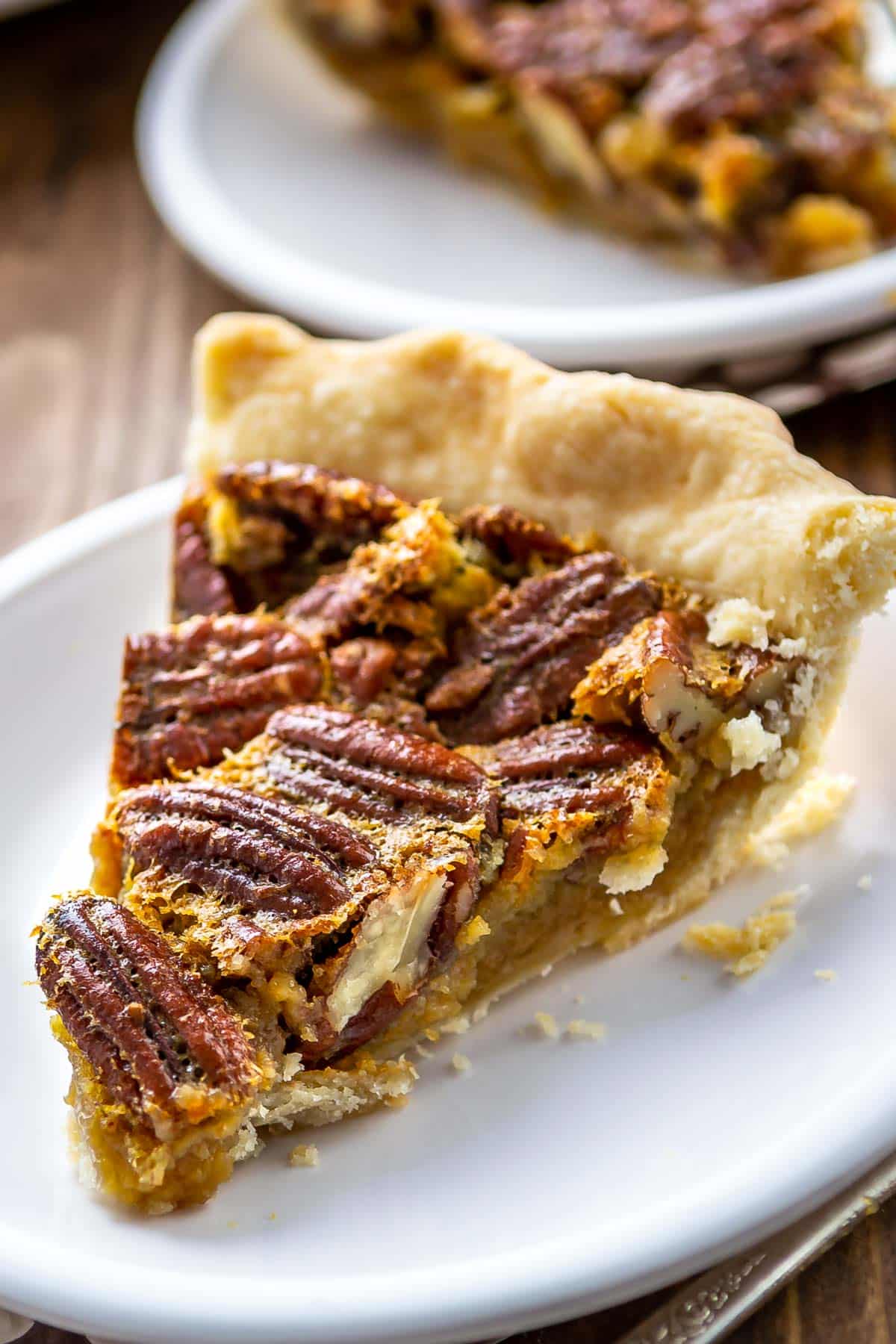 slice of pecan pie on white plate