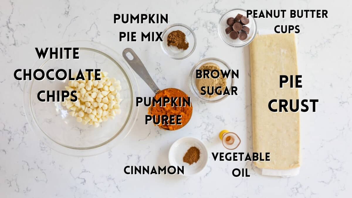 ingredients in pumpkin croissant laid out and words on top of the ingredients saying the name of the ingredient