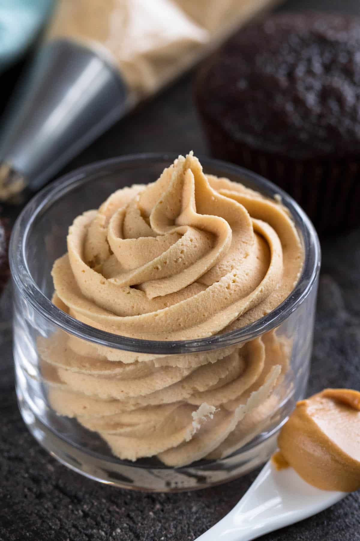 peanut butter frosting swirled in clear jar