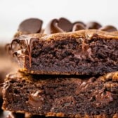 stacked chocolate chip cookie bars with words on top