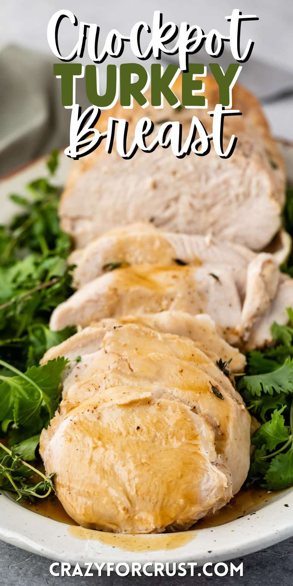 turkey cut into slices on a white plate surrounded by greens and words on top of the image