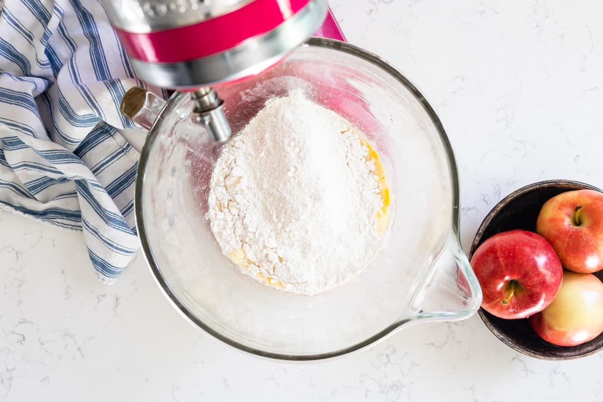 stand mixer with flour and dough.