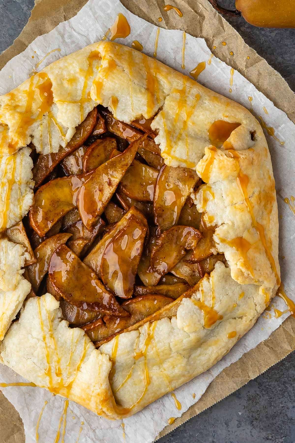 circular pear pastry dessert on parchment paper