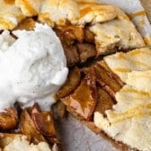 circular pear dessert with ice cream on top and words saying the name of the recipe