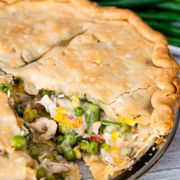 pot pie filled with veggies in a clear pan