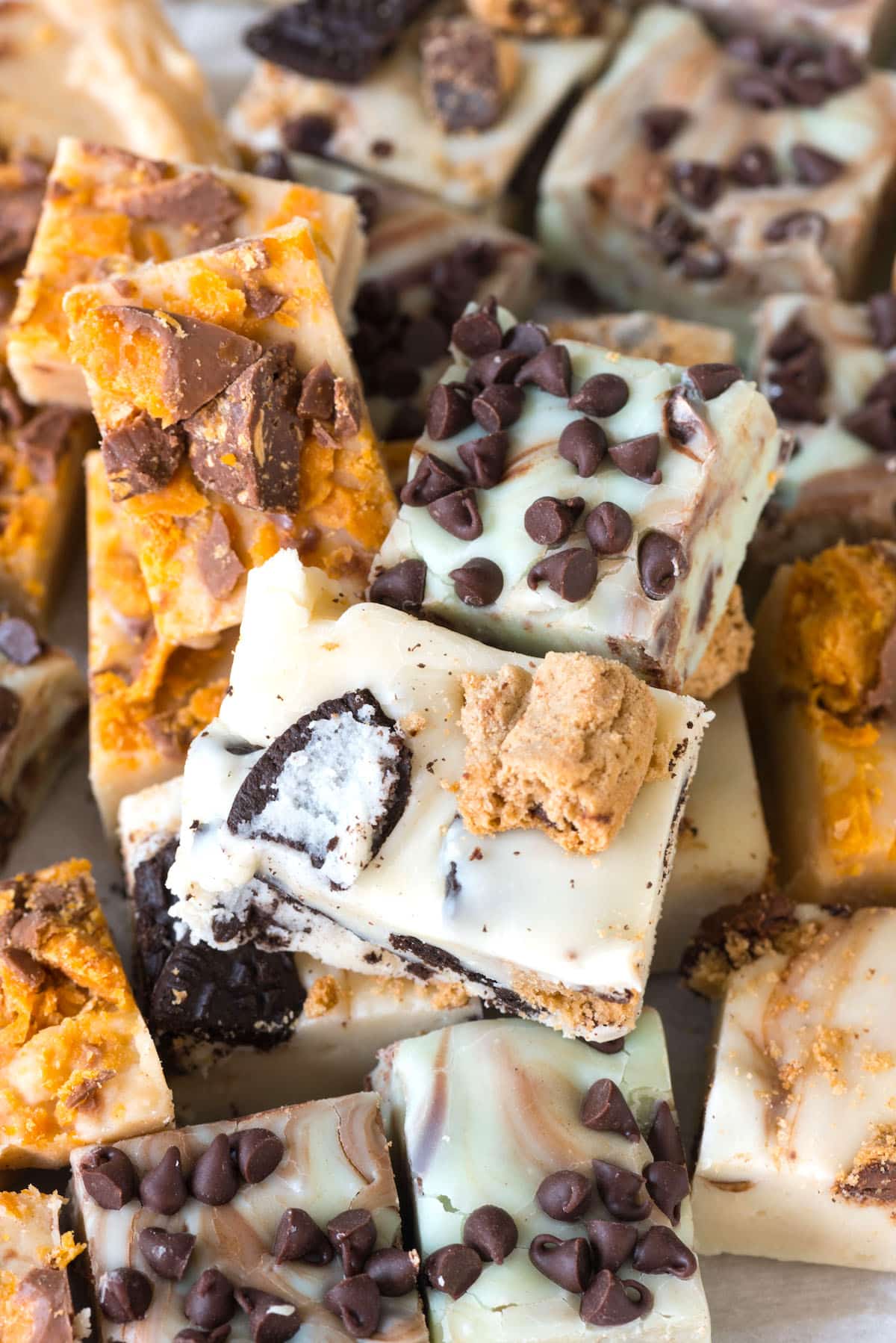 multiple kinds of white chocolate fudge with different toppings