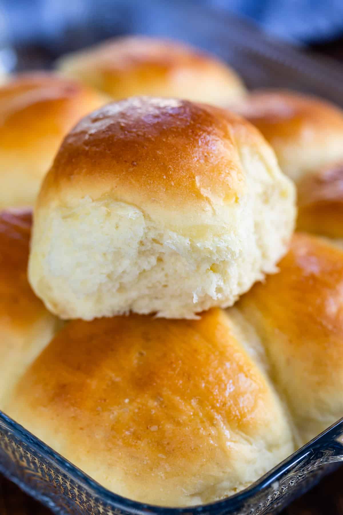 a potato roll stacked on other potato rolls