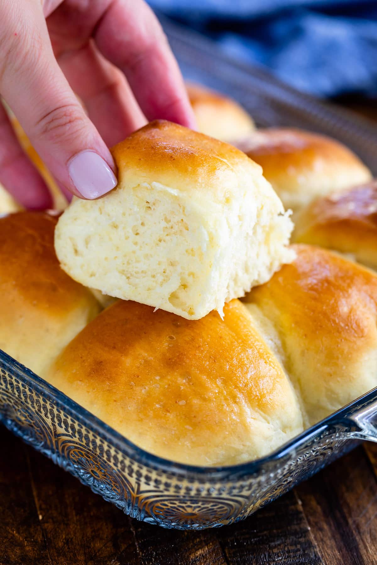 a potato roll stacked on other potato rolls