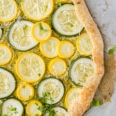 circular shaped pizza with squash as topping