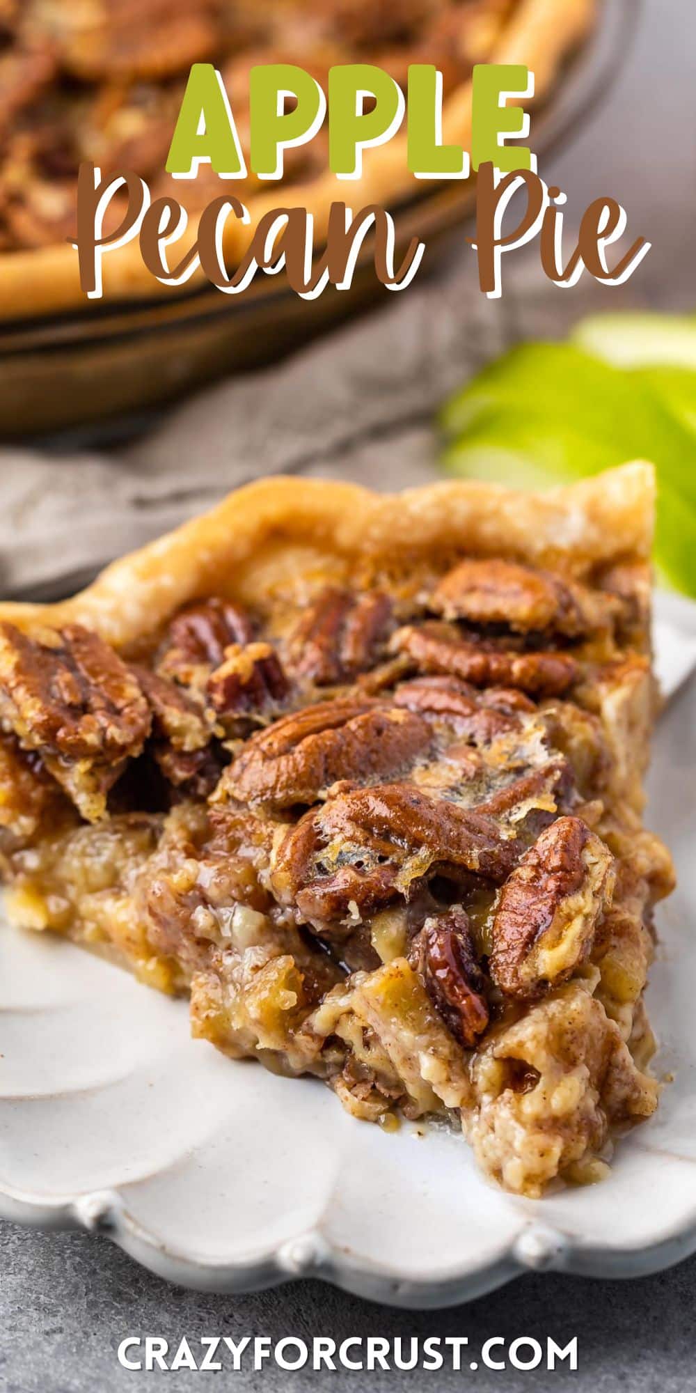 one slice of pecan pie on a white plate with sliced apples in the back with words on top