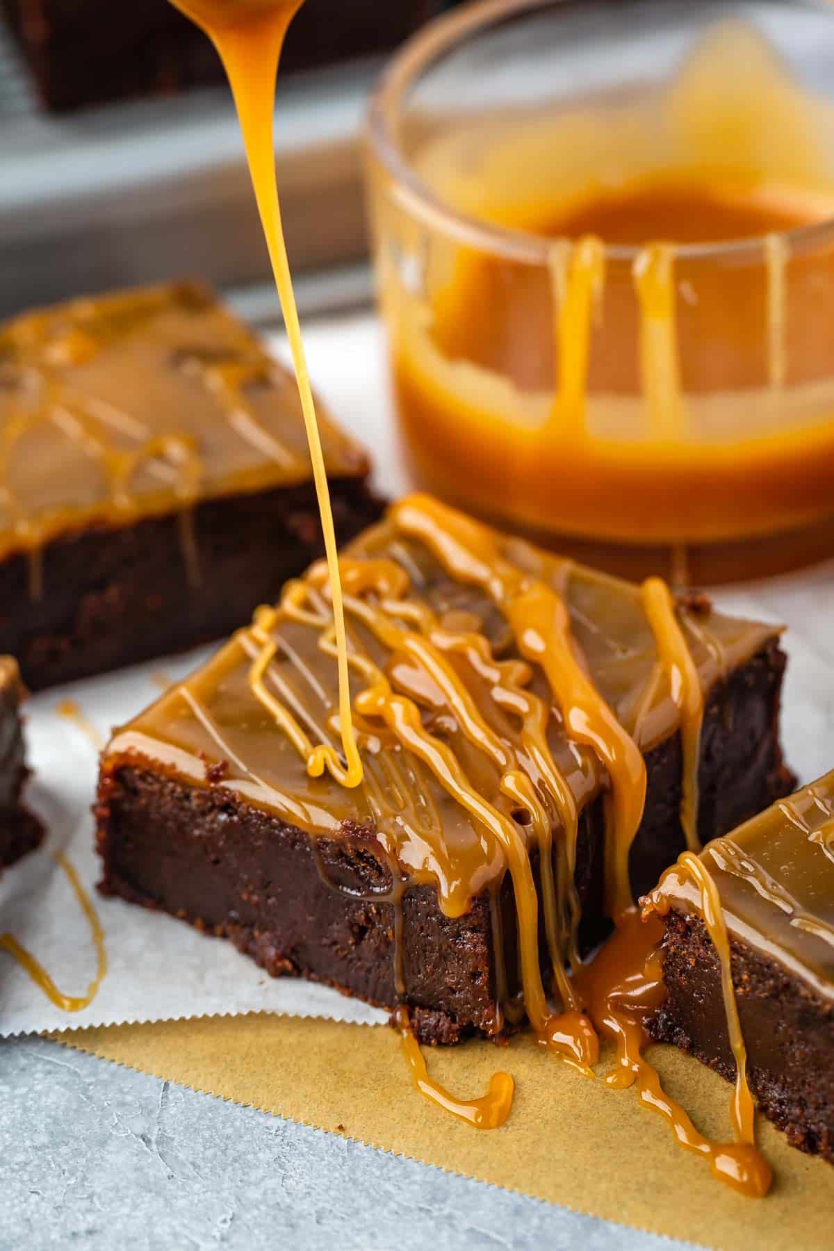 a brownie with caramel baked and dripped on top