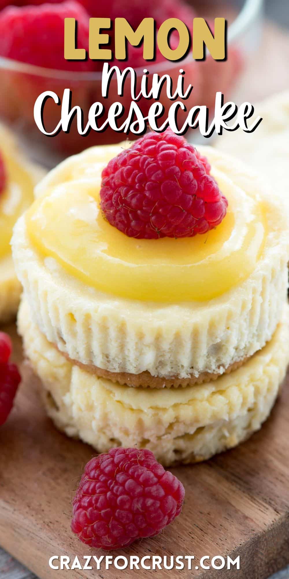mini cheesecake with lemon curd and a raspberry on top with words on the image