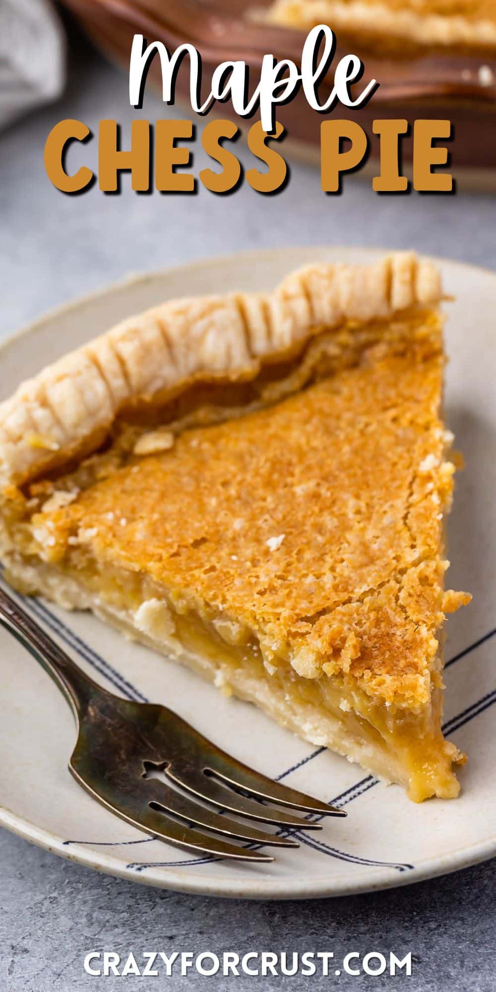 slice of apple chess pie on a tan plate next to a fork with words on the image