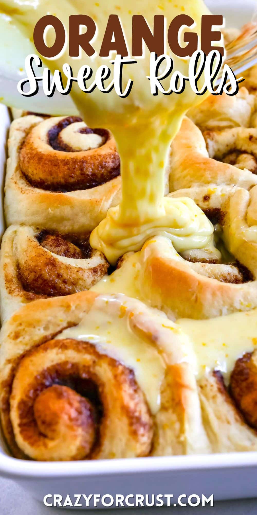 sweet rolls with frosting being poured out of a clear bowl onto the sweet rolls with words on the image