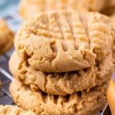 stack of 3 peanut butter cookies on rack