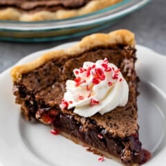 chess pie with whipped cream on and peppermint on top