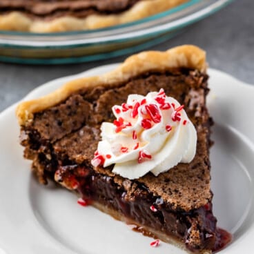 chess pie with whipped cream on and peppermint on top