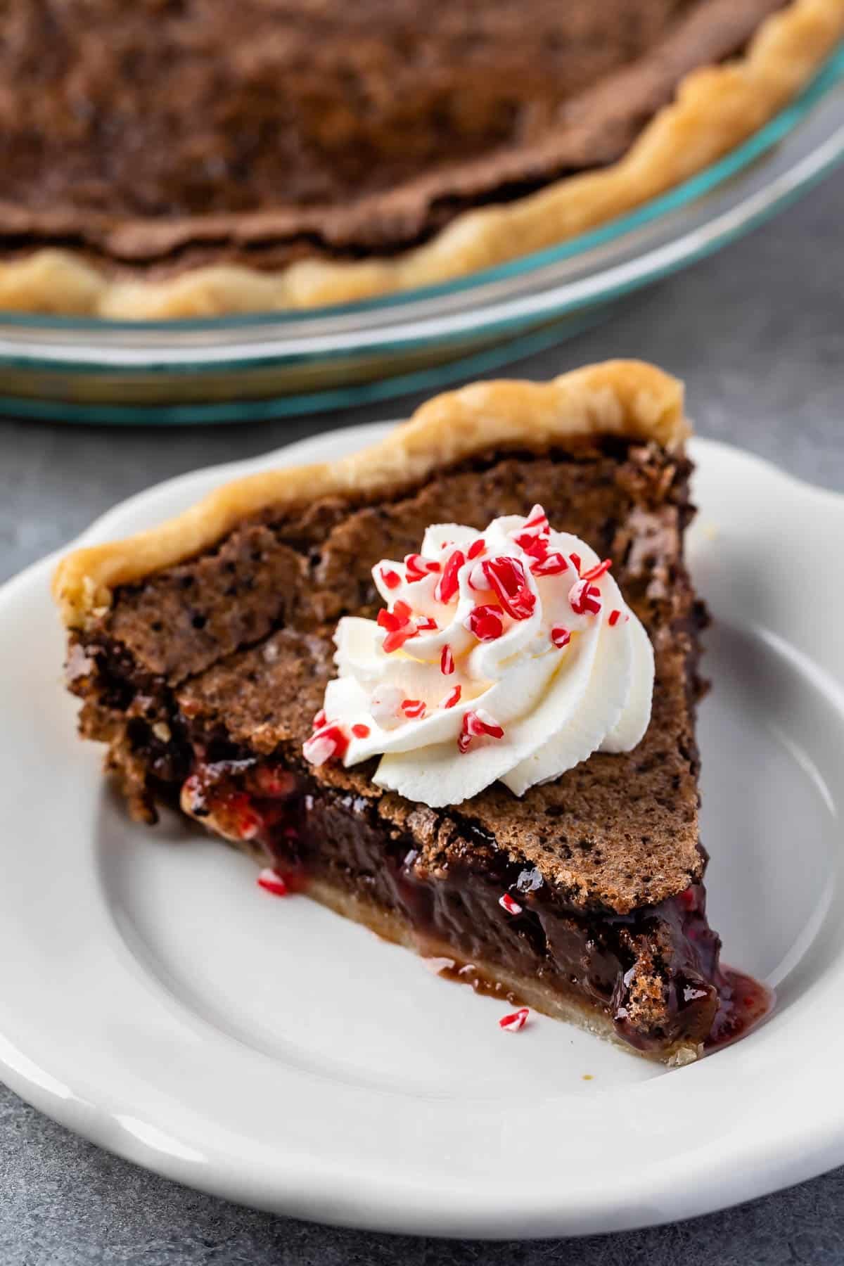 chess pie with whipped cream on and peppermint on top