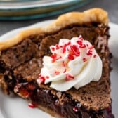 chess pie with whipped cream on and peppermint on top with words on the image