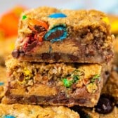 stacked gooey bars with M&Ms baked in
