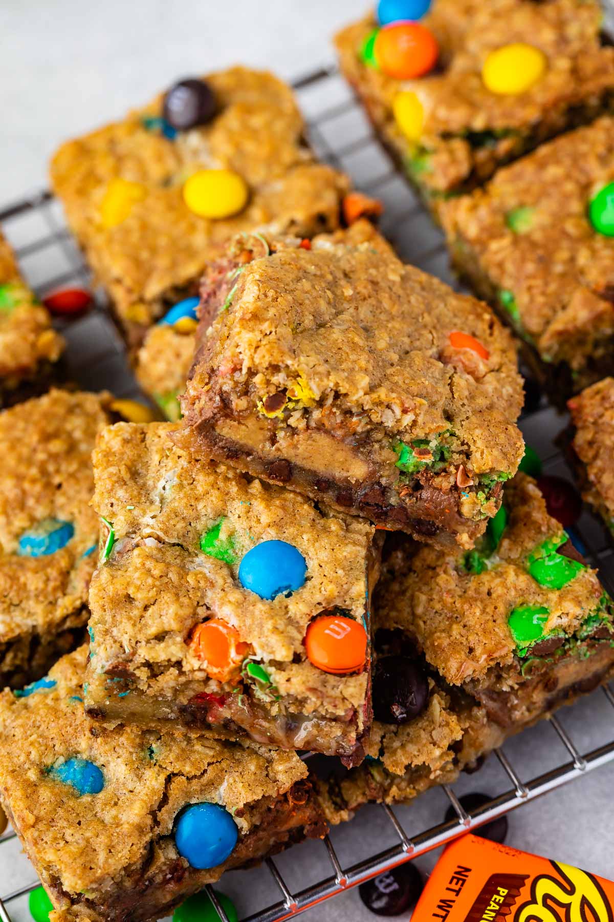 stacked gooey bars with M&Ms baked in