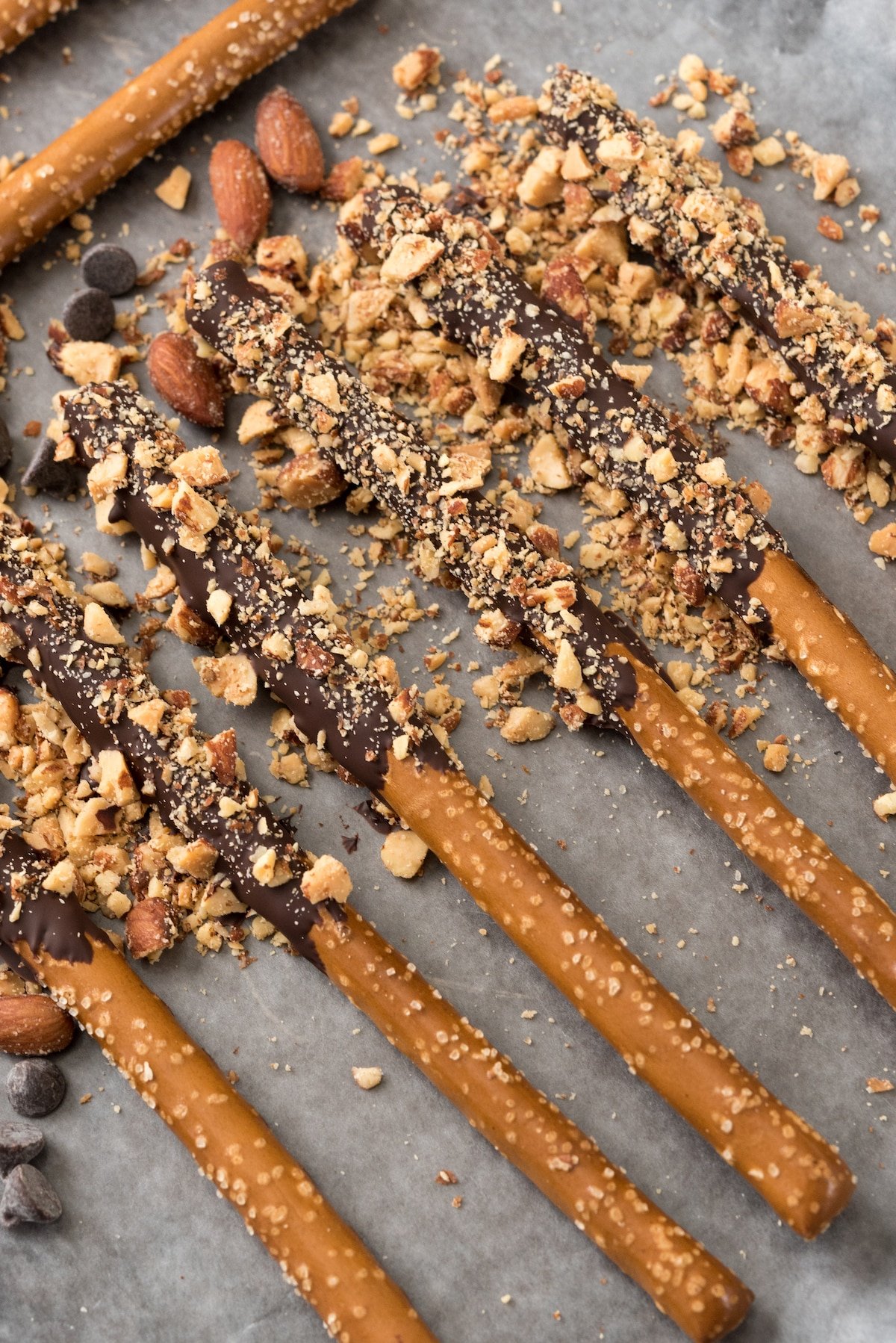 pretzel sticks dipped in chocolate and almonds