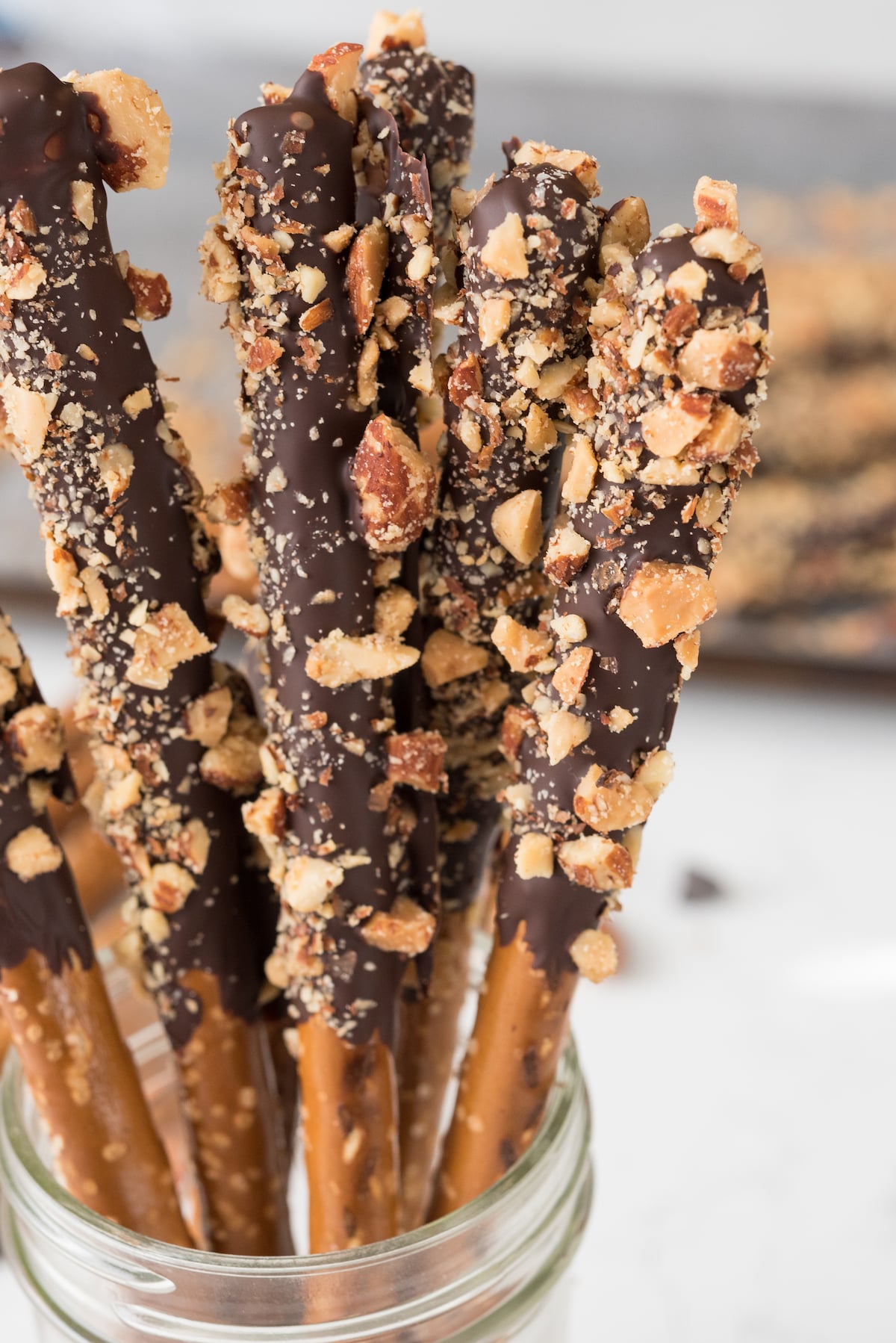 pretzel sticks dipped in chocolate and almonds