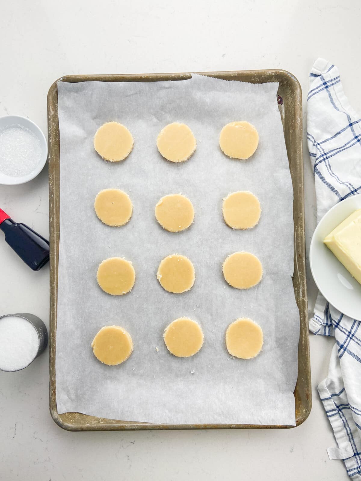 cookie rounds on parchment covered cookie sheet.