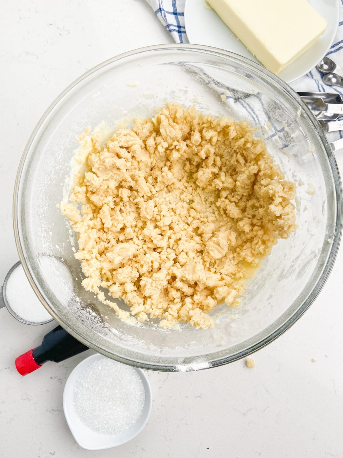 crumbly cookie dough in bowl.