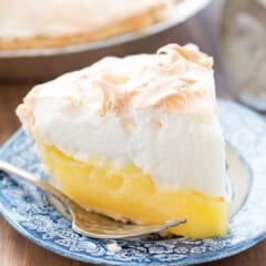 slice of lemon pie on blue plate