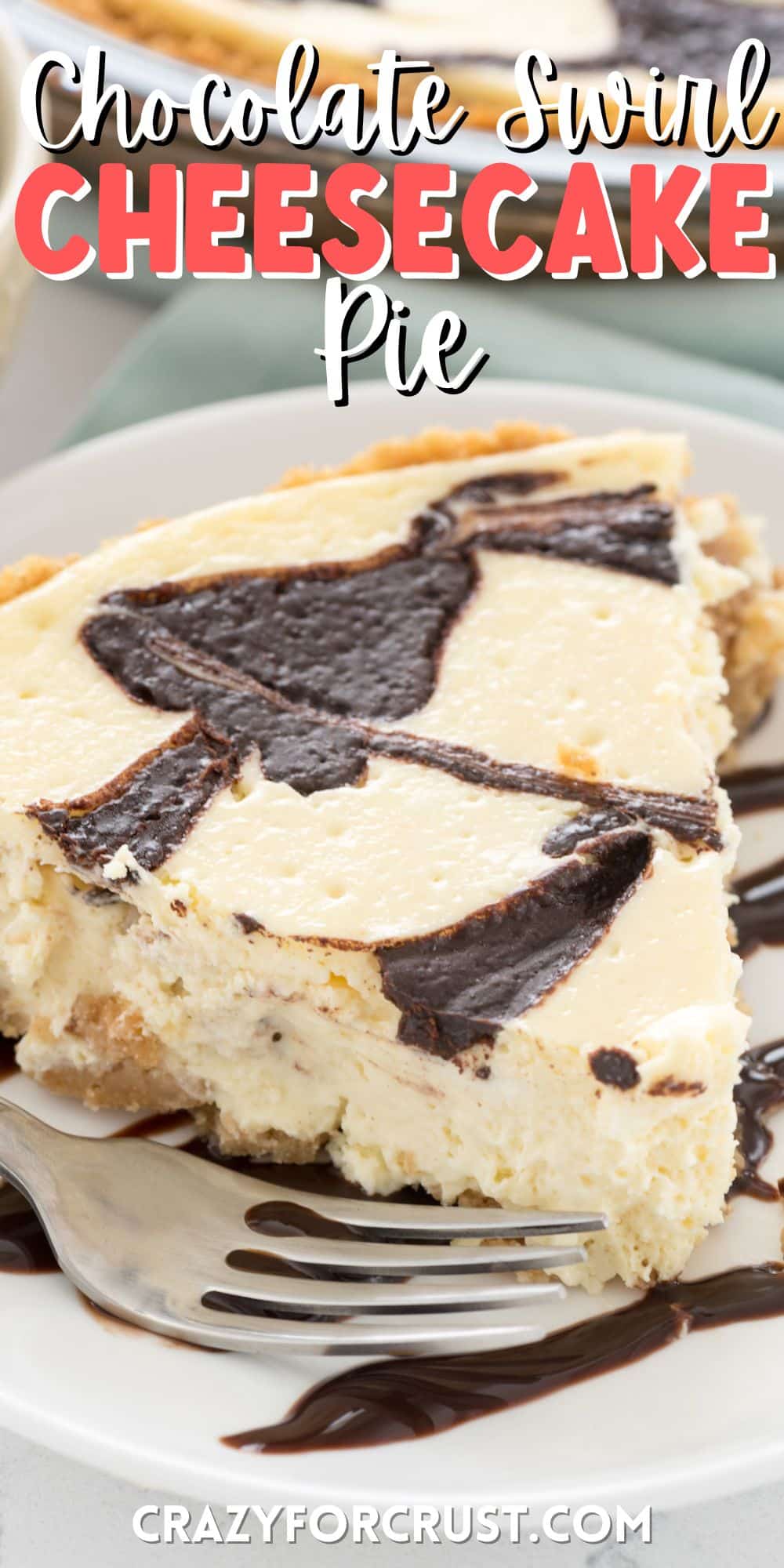 cheesecake pie on a white plate with chocolate dripped with words on the image