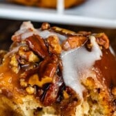 one sticky bun being sat on parchment paper with words on top