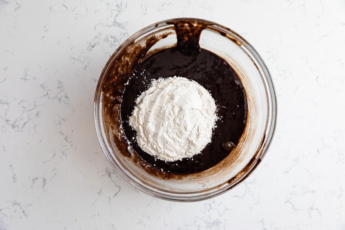 bowl of brownie batter with flour.