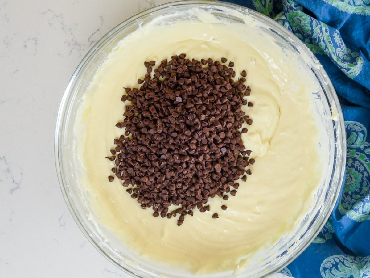 bowl of cheesecake batter with chocolate chips