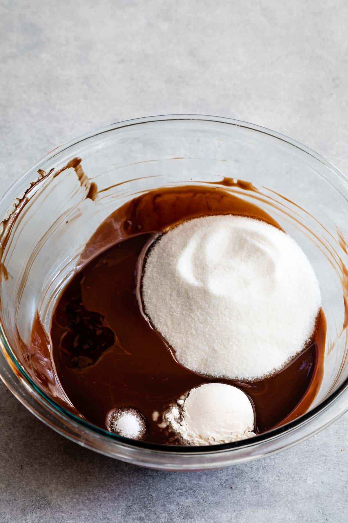 bowl with melted chocolate and sugar.