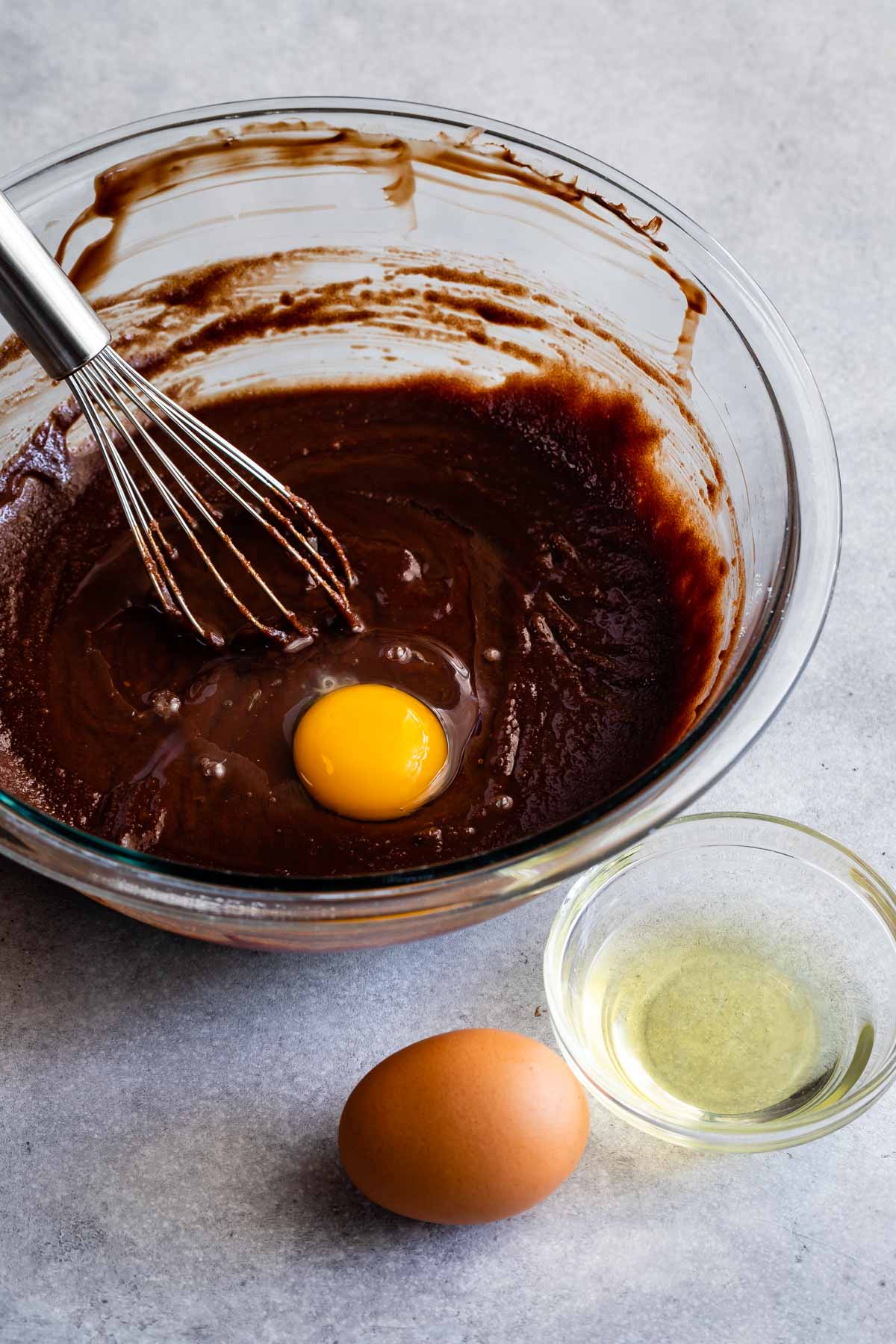 bowl with melted chocolate and egg.