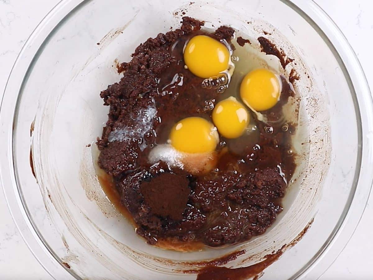 bowl of brownie batter and eggs