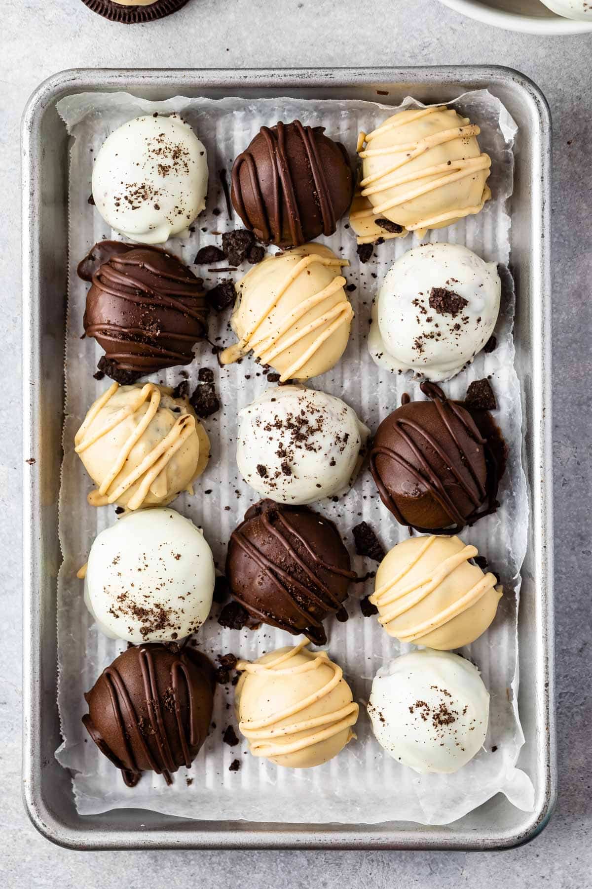 oreo truffles laid out on a pan
