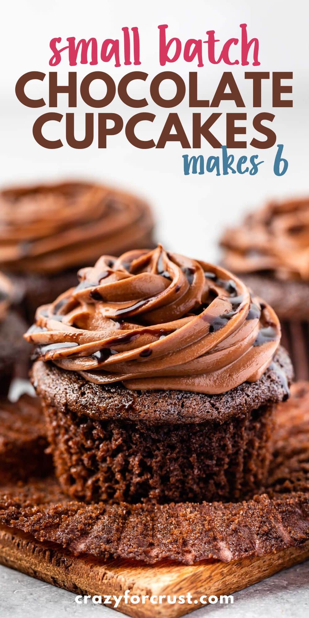 chocolate cupcakes on a counter with chocolate frosting and words on top