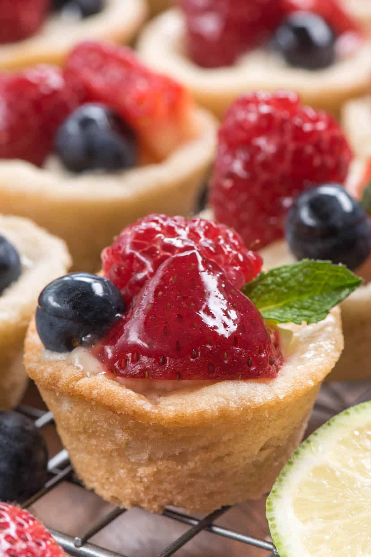 mini tarts with various fruits on top