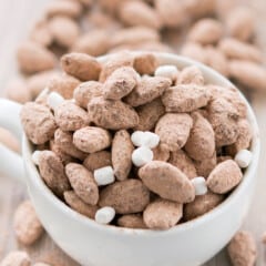 almonds in a white bowl mixed in with mini marshmallows