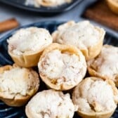 stack of mini pies on blue plate
