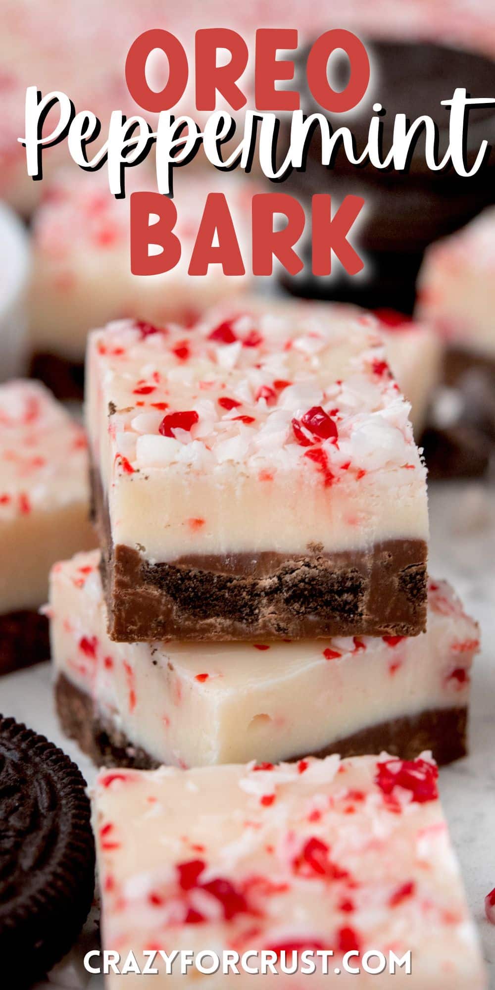 stacked peppermint bark that is topped with crushed peppermint and words on top
