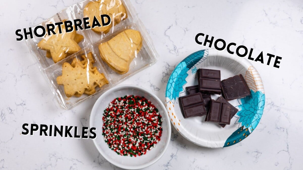 ingredients in chocolate dipped shortbread cookies laid out on a white counter