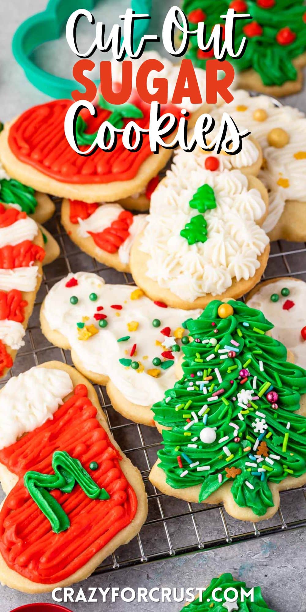 christmas shaped cookies with frosting decorating the cookies with words on top