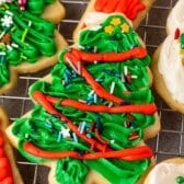 tree shaped cookie with frosting decorating the cookies