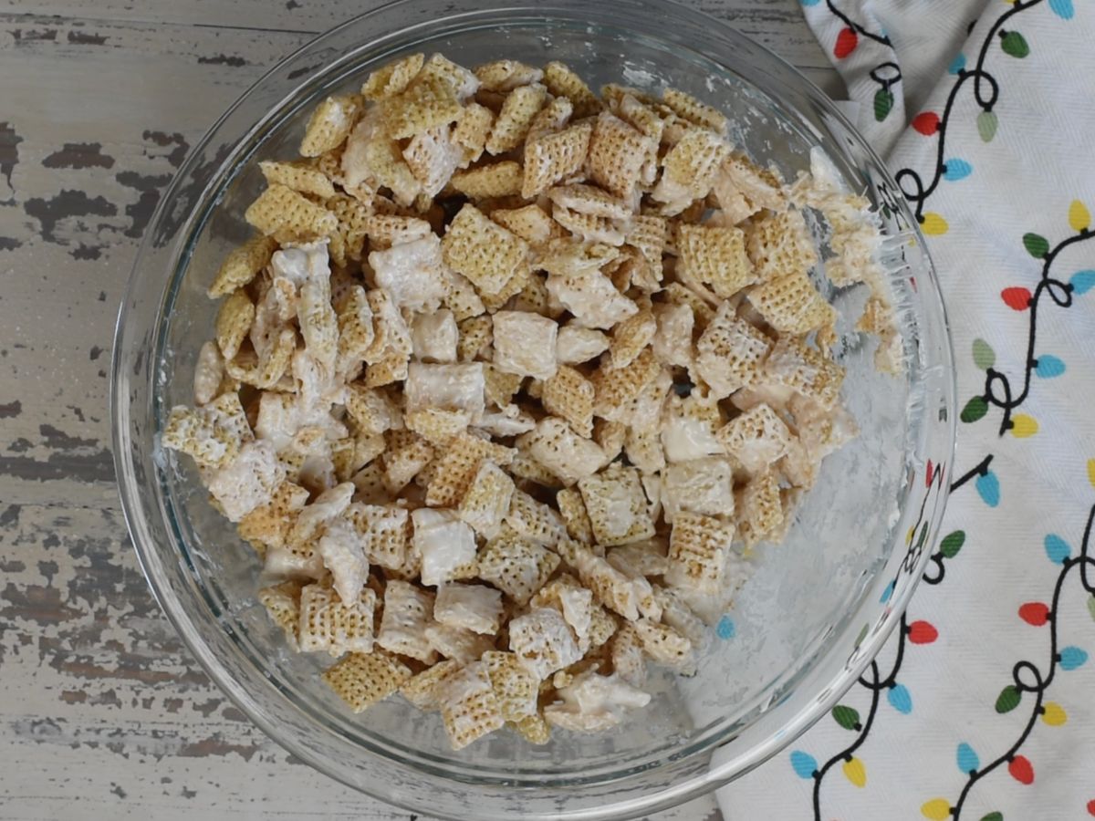 bowl of Chex cereal coated in white chocolate.